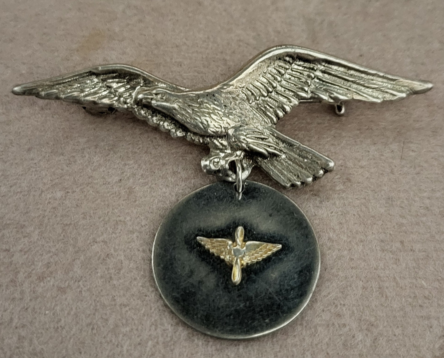 Vintage WW2 Sterling Silver Egale Pin Holding Pendant with Propeller Wings