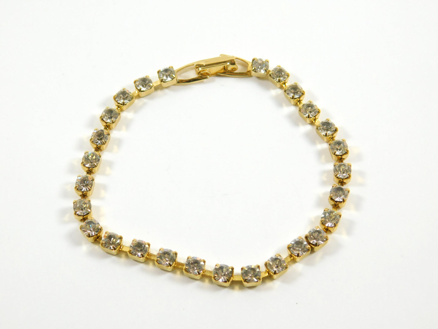 Gold Tone Tennis Bracelet with Rhinestones