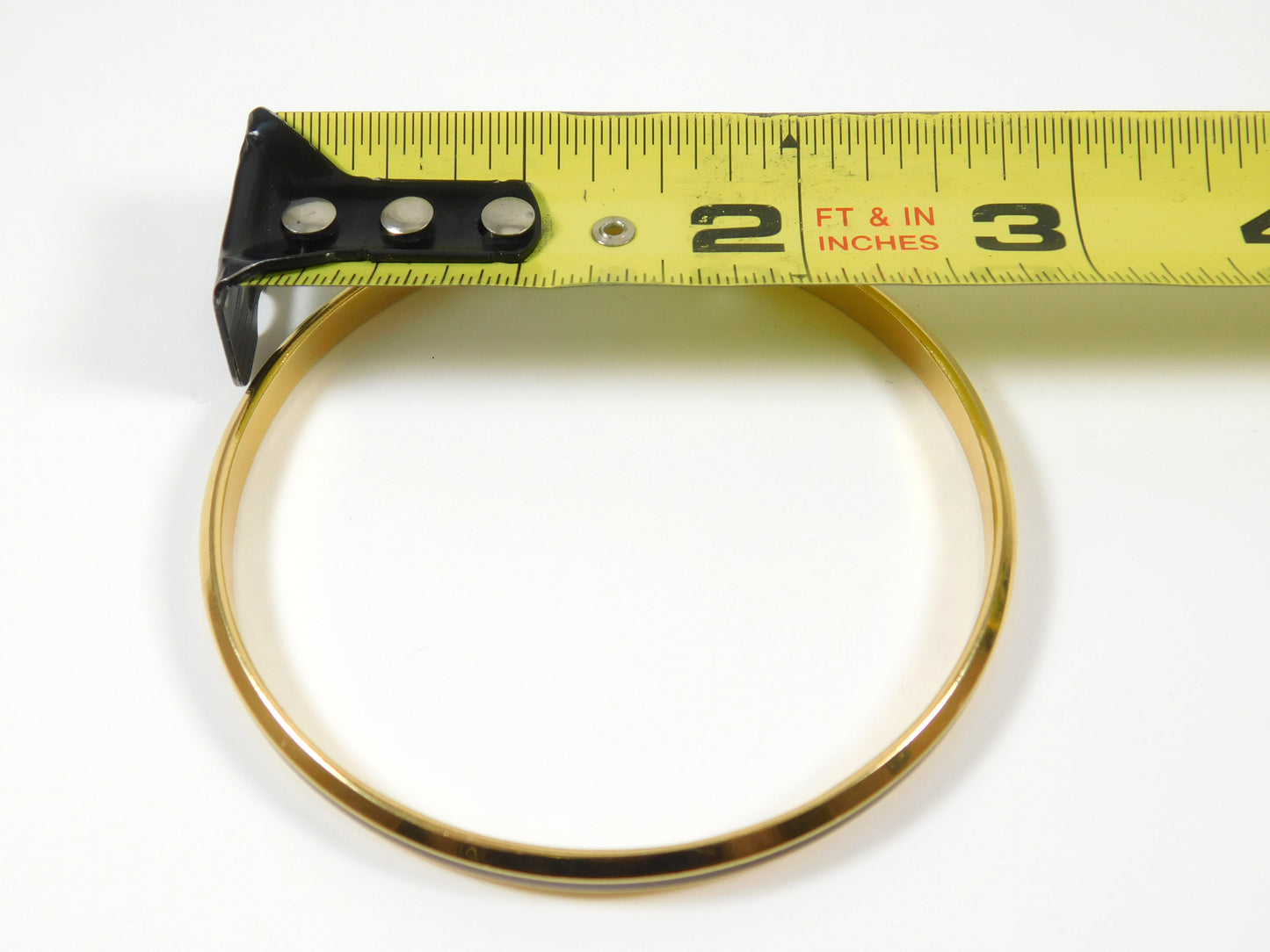 2 Black and Gold Tone Bangle Bracelets