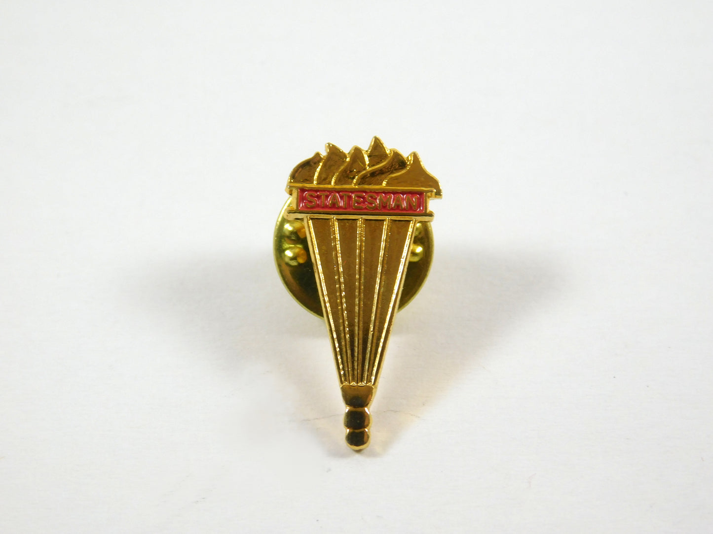 Vintage Statesmen Torch Gold Tone Lapel Pin