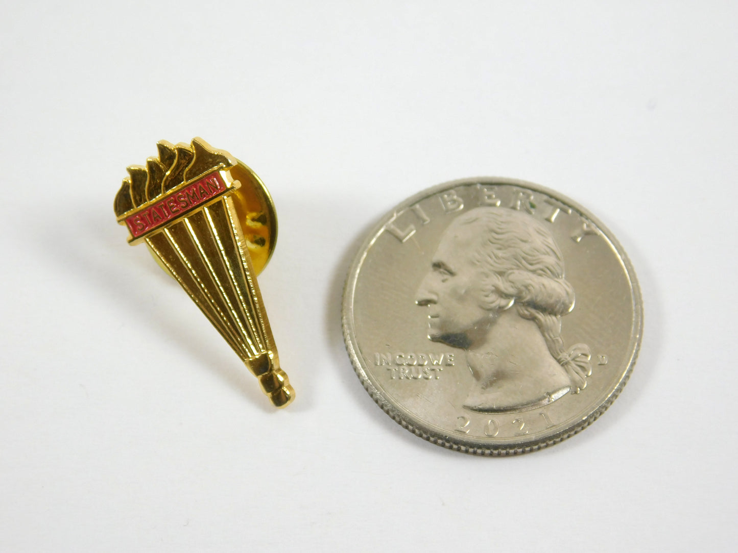 Vintage Statesmen Torch Gold Tone Lapel Pin