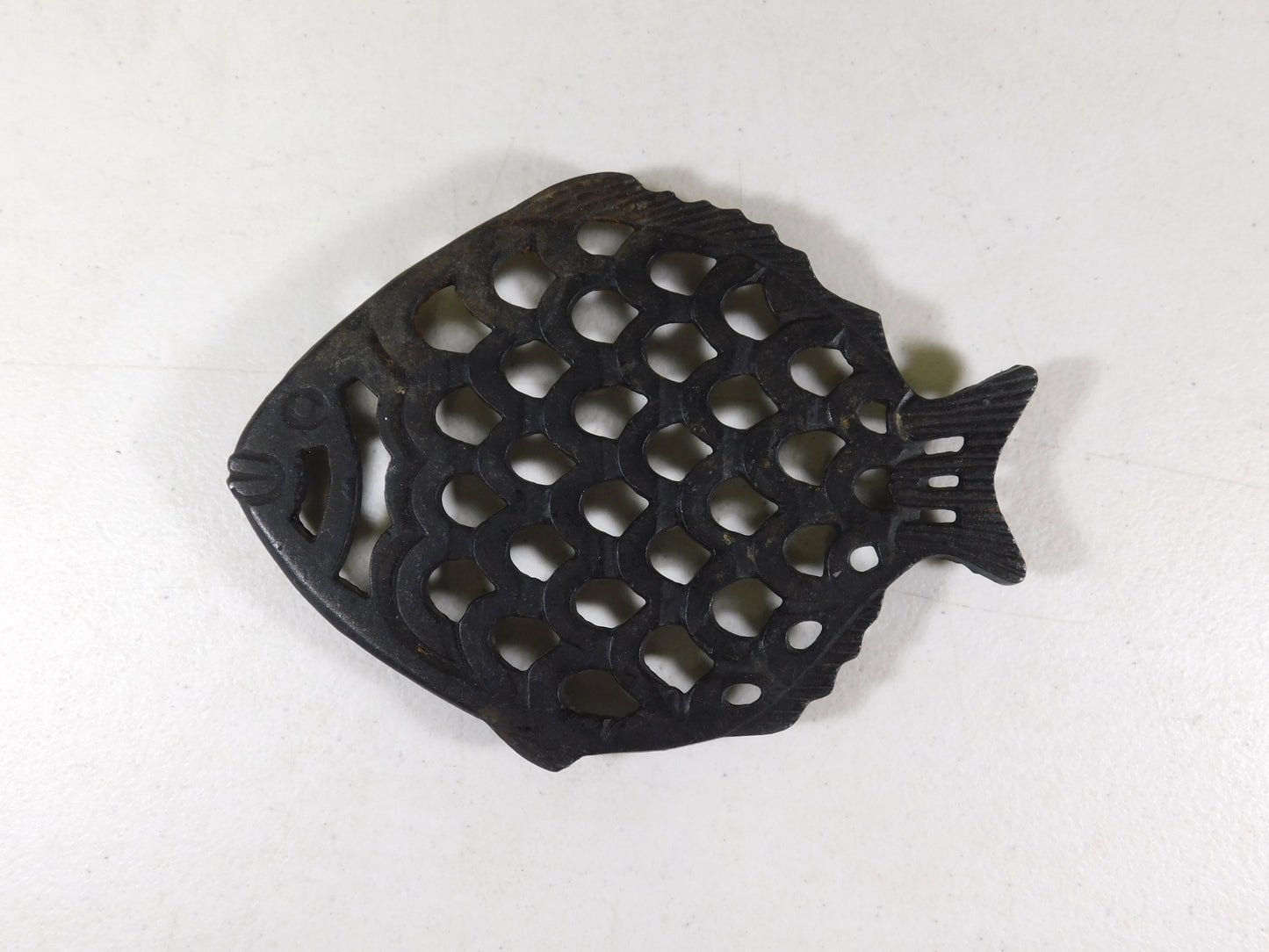 Four Vintage Cast Iron Metal Trivets - Fish, Spade, Pig, Brooms