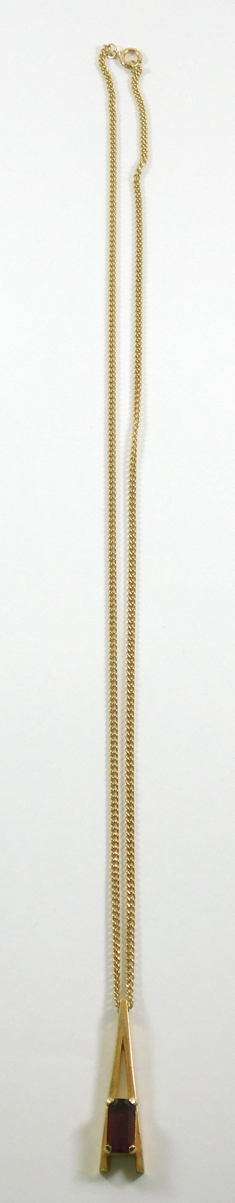 Vintage Avon Gold Tone "A" Shaped Necklace with Rectangular Purple Gem