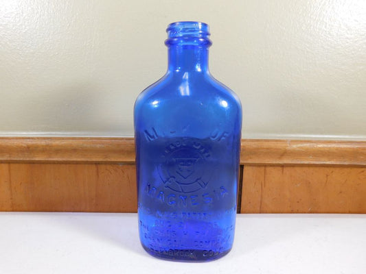 Vintage Milk of Magnesia Blue Bottle