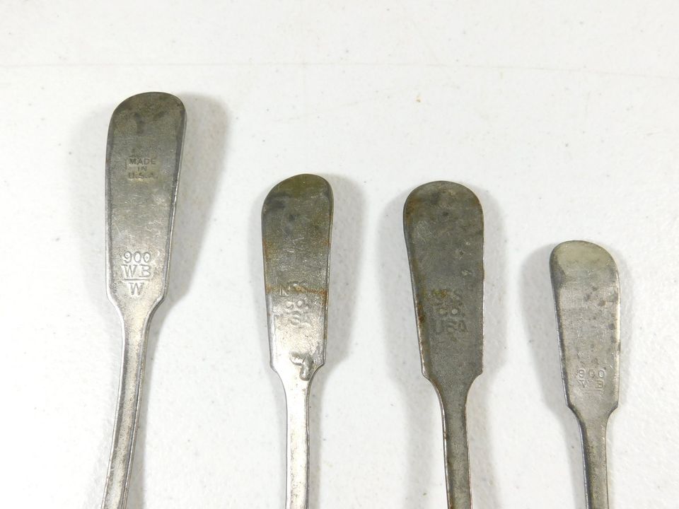 Set of Four Vintage Metal Spoons