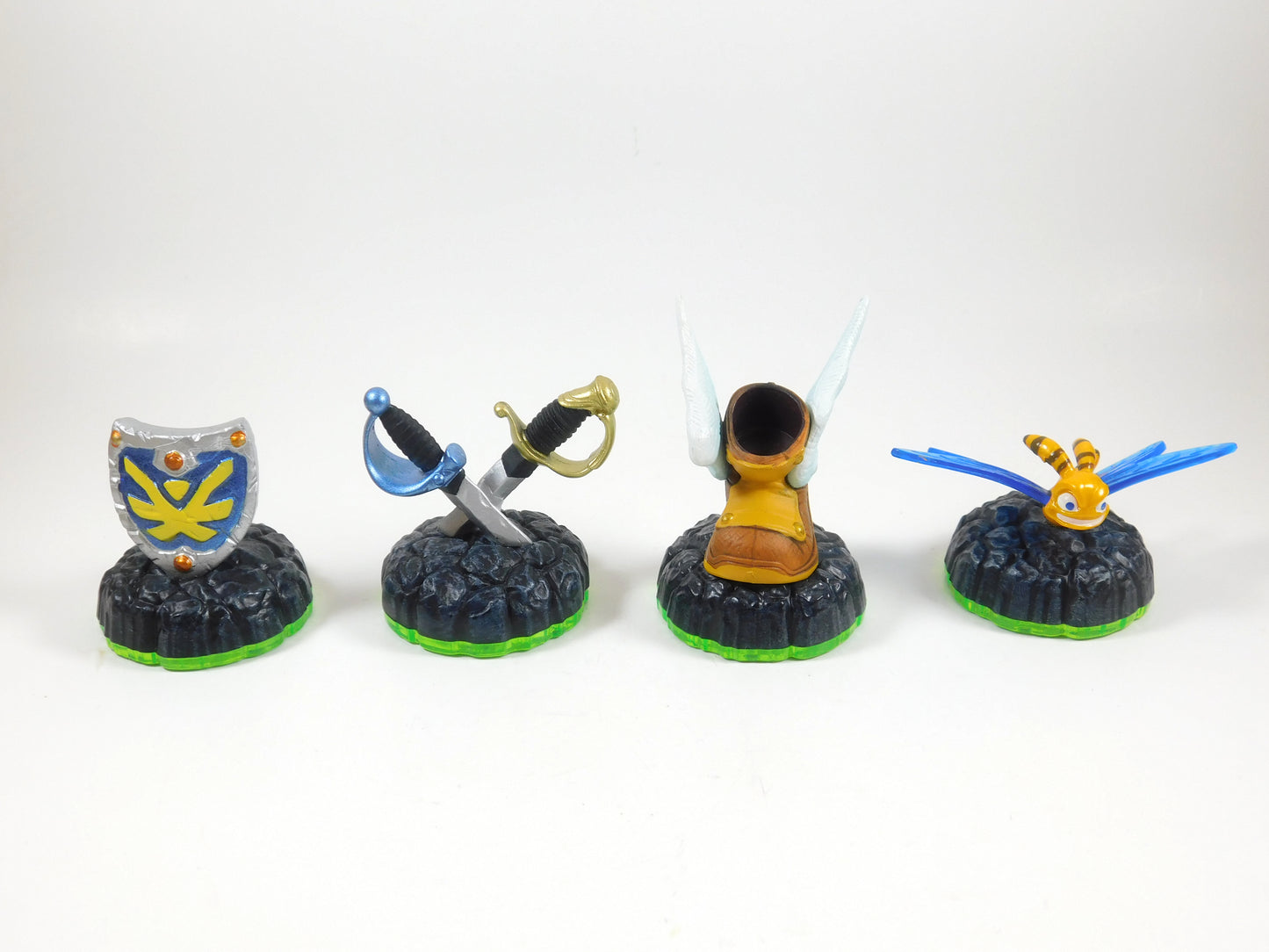 4 Skylanders Figures Winged Boot, Sky Iron Shield, Ghost Swords, Sparx Dragonfly