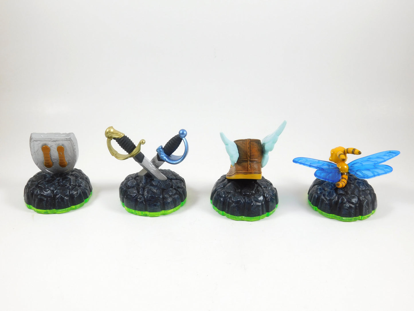 4 Skylanders Figures Winged Boot, Sky Iron Shield, Ghost Swords, Sparx Dragonfly