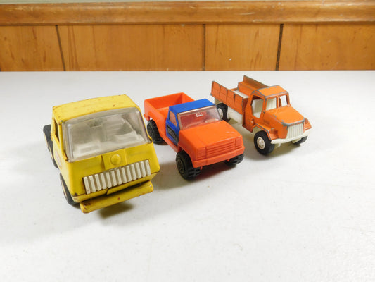 2 Tonka and 1 TootsieToy Trucks