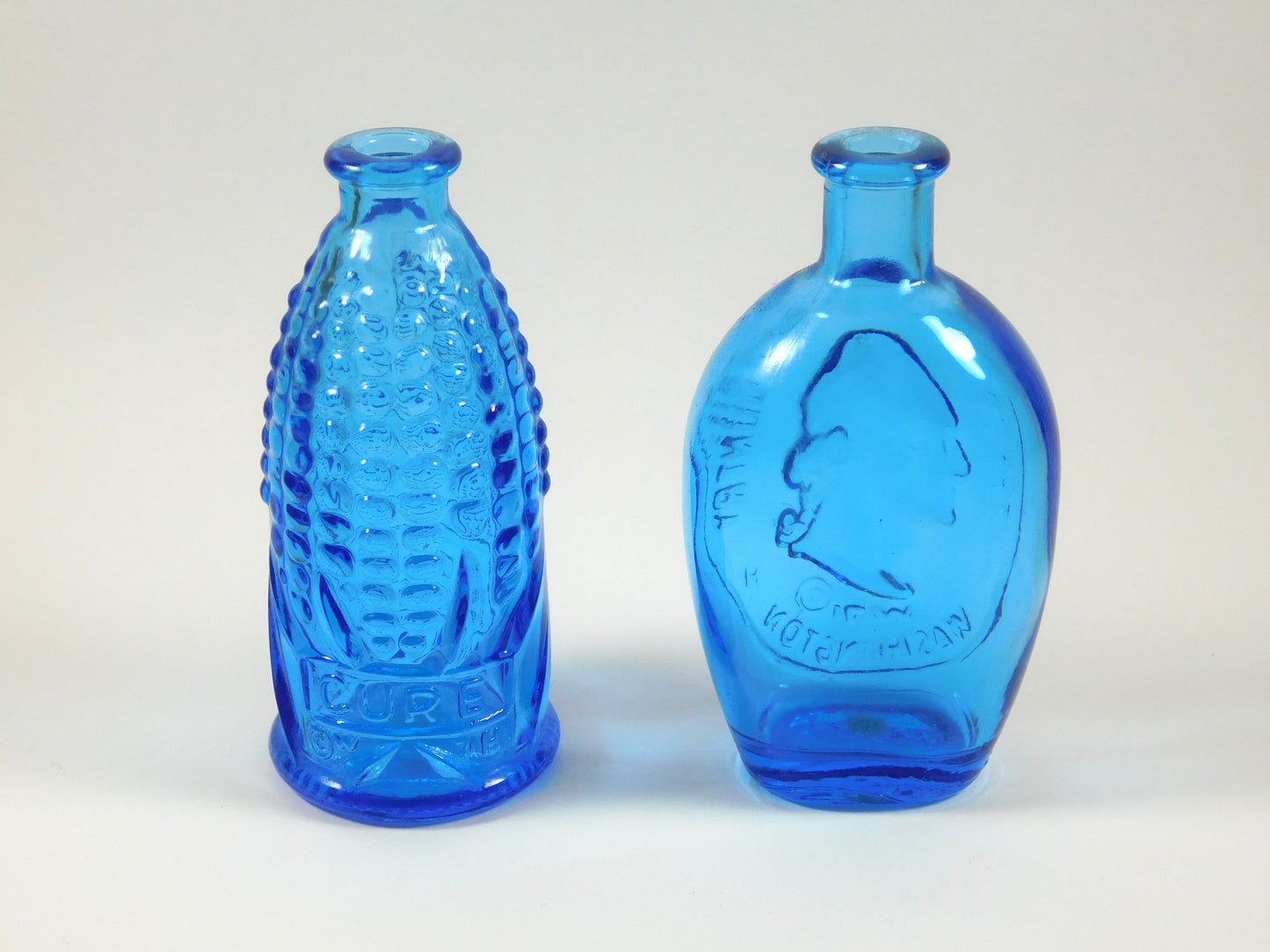 Set of 2 Vintage Blue Glass Bottles Old Doc's Cure and Washington