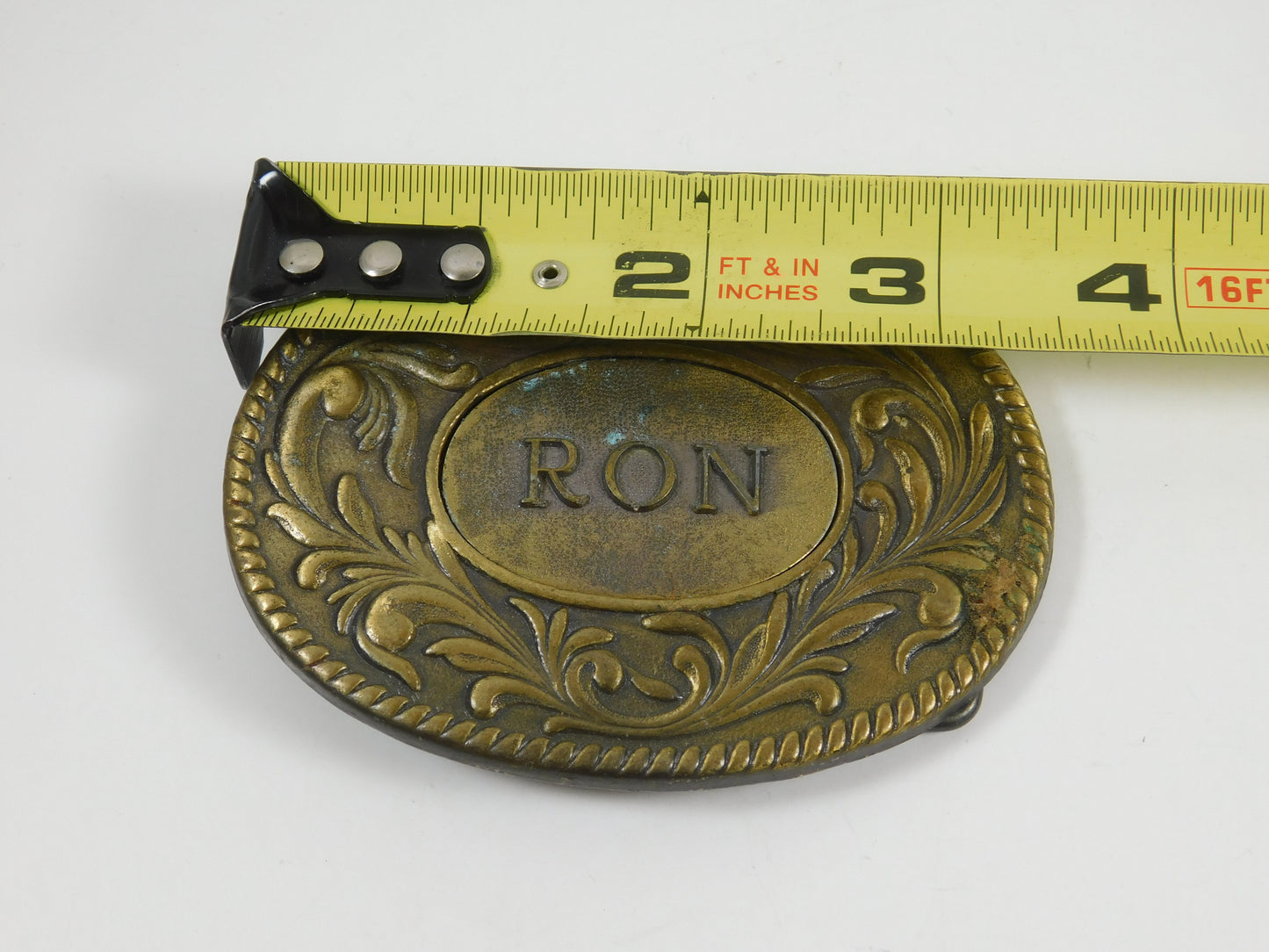 Vintage 1977 The Kinney Co "Ron" Metal Belt Buckle